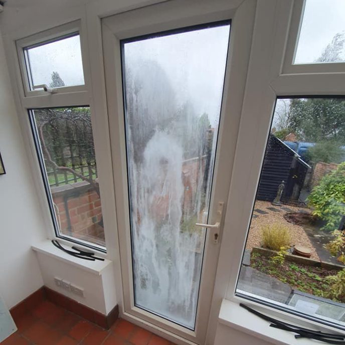 Misted Conservatory Door Replacement with Cat Flap - Before